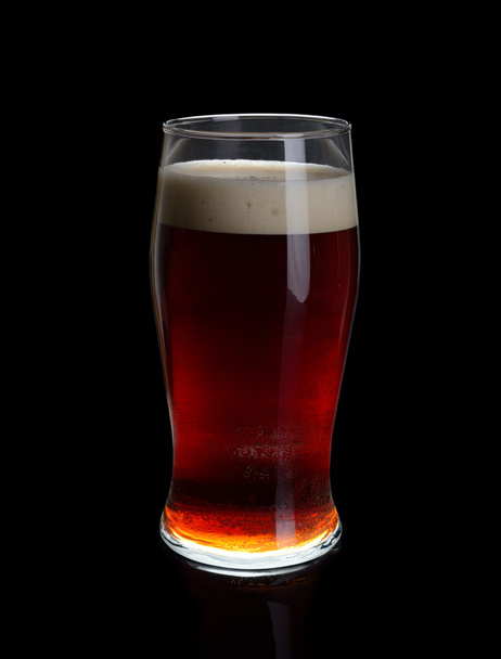 A glass of dark beer. - Photo, Image