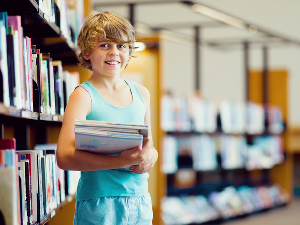 Boy in library - Photo, image
