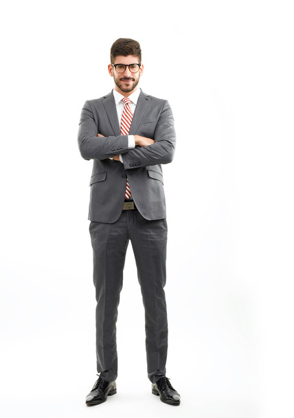 Young businessman on white - Foto, afbeelding
