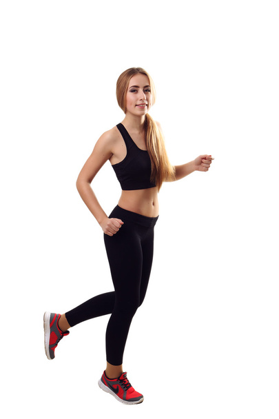 Running fitness woman isolated. Female runner in sporty pink fit - Photo, image