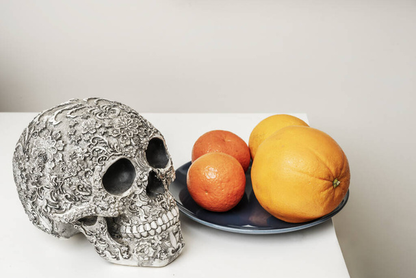 A skull in need of vitamins on a white shelf - Photo, Image