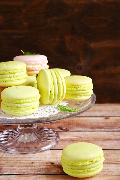 Fresh macaroon on small stand - Foto, imagen