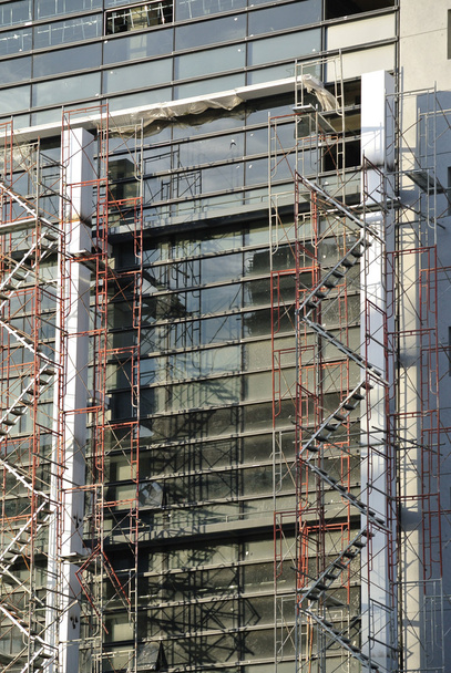 Scaffolding erected at the external wall of the building - Photo, Image
