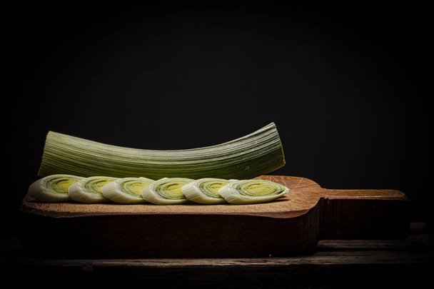 fresh green zucchini slices on black board - Photo, Image