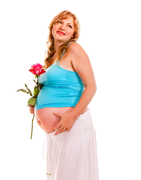 těhotná žena s květinou. - Fotografie, Obrázek