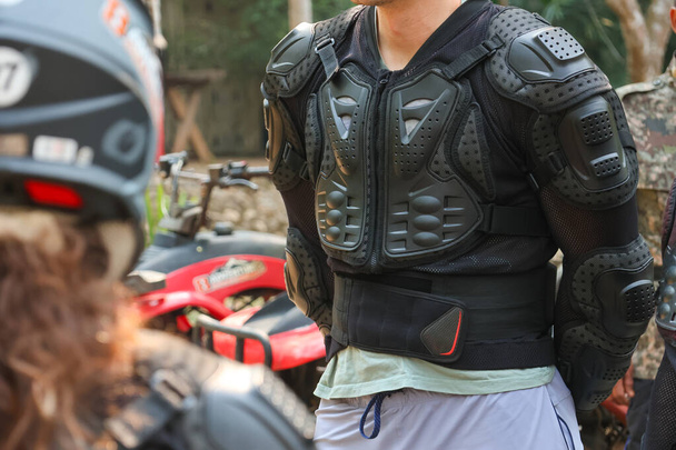 Black body armor for off-road driving. For driving adventures To increase safety, wear it and look cool for groups driving motocross motorcycles. - Photo, Image