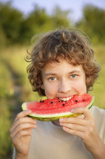 happy teenager eating watermelon - Photo, Image