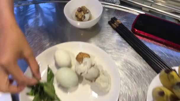 Egg with embryo Vietnamese delicacy. Balut boiled developing duck embryo in Hoi An, Vietnam. special cuisine in Asian countries. - Footage, Video