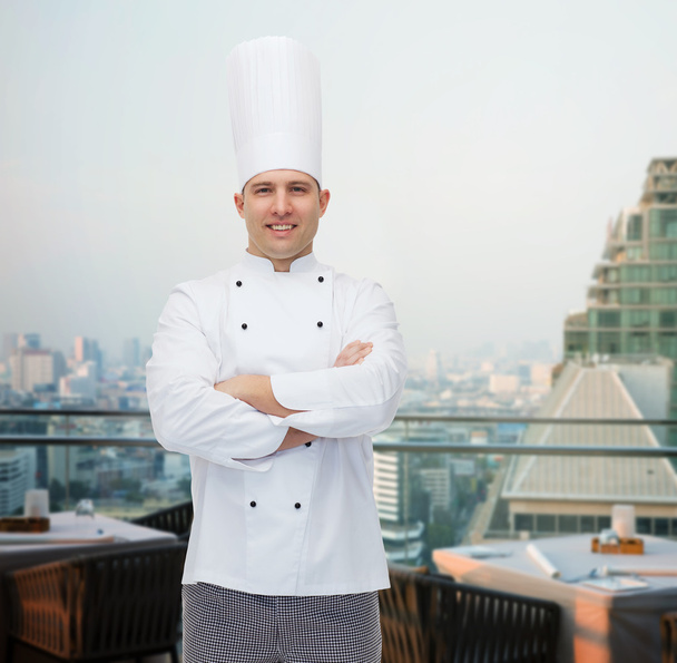 happy male chef cook with crossed hands - Фото, зображення