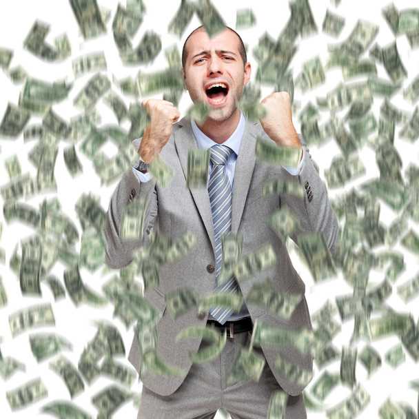 Happy man enjoying rain of money - Foto, Imagen