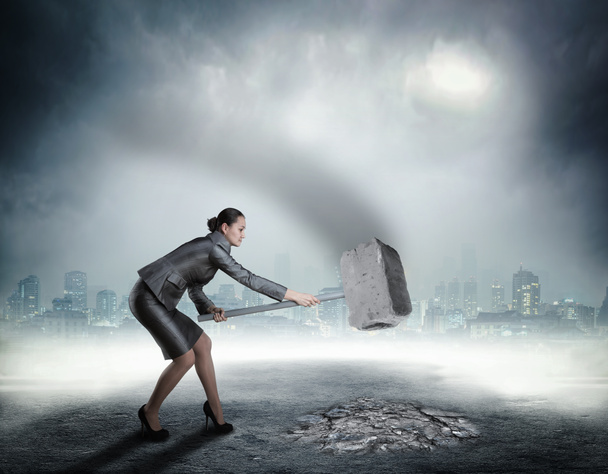 Angry Businesswoman with sledgehammer - Photo, Image