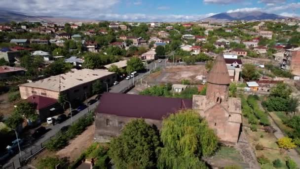Aerial orbit movement around ancient Armenian church Saint Marianeh nestled in Ashtarak, Armenia. Autumn shot - Footage, Video