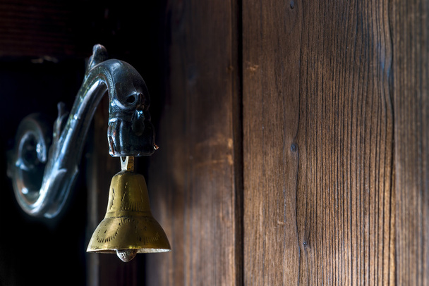 brass bell at the door to the old style - Photo, Image