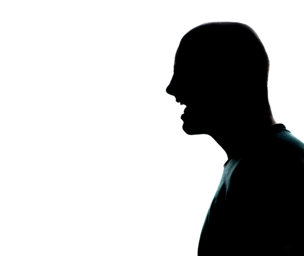 one caucasian man portrait silhouette profile screaming angry in studio on white background - Photo, Image