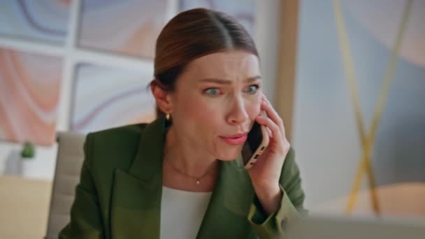 Mad designer calling colleague having nervous conversation in office closeup. Dissatisfied ceo arguing mobile phone at workplace. Furious businesswoman holding paper scolding subordinator at call  - Footage, Video