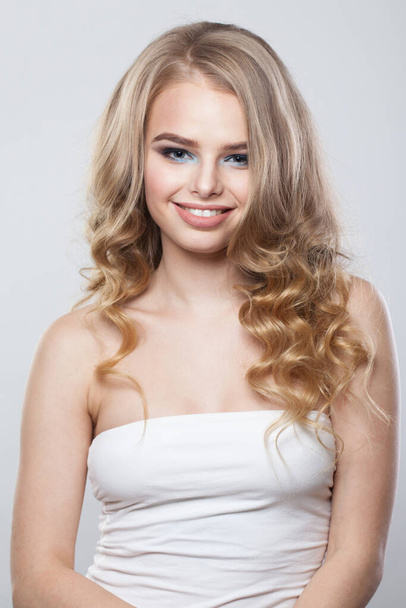 Joyful blonde beauty. Young woman portrait - Photo, Image