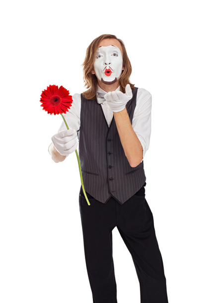 mime actor with a flower - Фото, изображение