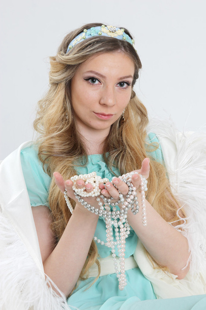 Blond girl with jewelry - Fotó, kép