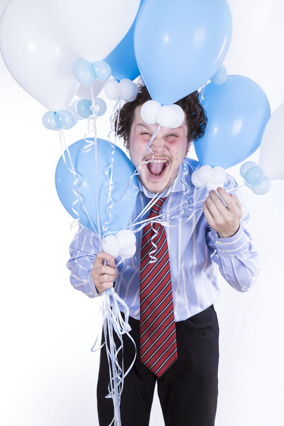 Funny man with balloons - Фото, изображение