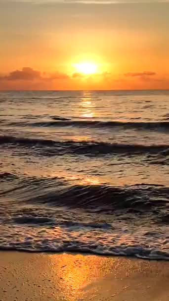 Sunrise, sunset on sea. Rising sun, setting sun over rolling sea waves with white foam. Sundown dawning sea. Sea water sun sky morning. Seascape view. Natural nature background. Vertical - Footage, Video