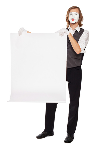 mime actor shows a white sheet - Foto, Imagen