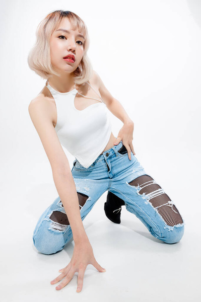 Fashionable asian woman short hair with Perfect body. Cute female model with natural makeup and sparkling eyes on white isolated background. Facial treatment, Cosmetology, beauty Concept. - Zdjęcie, obraz