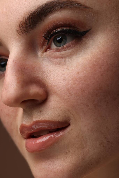 Beautiful woman with makeup and fake freckles, closeup - Fotoğraf, Görsel