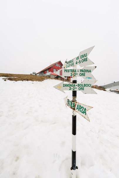  Wooden signpost in snow above Romanian ski - Photo, Image