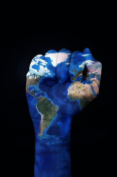 Поднятый кулак с картой мира
 - Фото, изображение