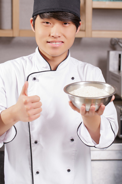 Sushi chef cooks rice - Φωτογραφία, εικόνα