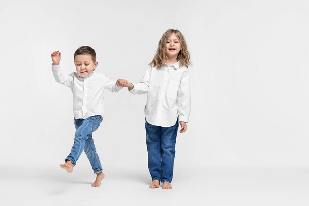 Cute little children on white background. Space for text - Photo, Image
