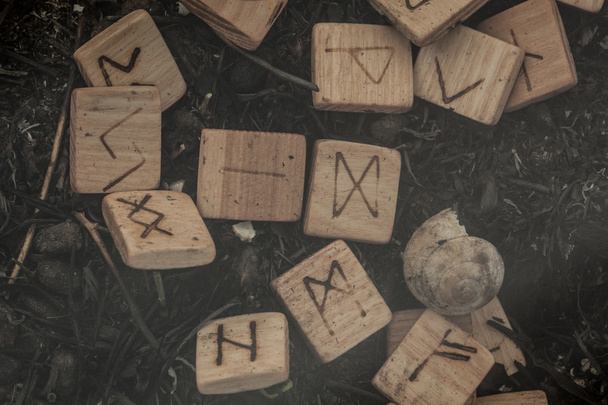 Wooden runes on the ground - Photo, Image