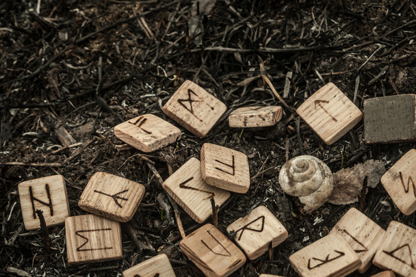 Wooden runes on the ground - Photo, Image