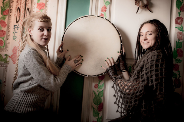 Two beautiful woman with  tambourine - Photo, Image