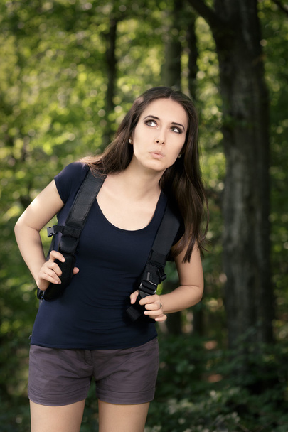 Disoriented Hiking Girl with Travel Backpack - Foto, Bild