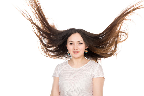 Asian brunette girl with long hair. - Fotografie, Obrázek