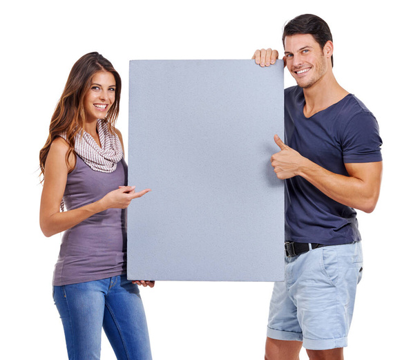 Happy couple, portrait and thumbs up with empty poster on studio background by mockup space for presenting, marketing and advertising. People, models or partners together with blank billboard. - Photo, Image