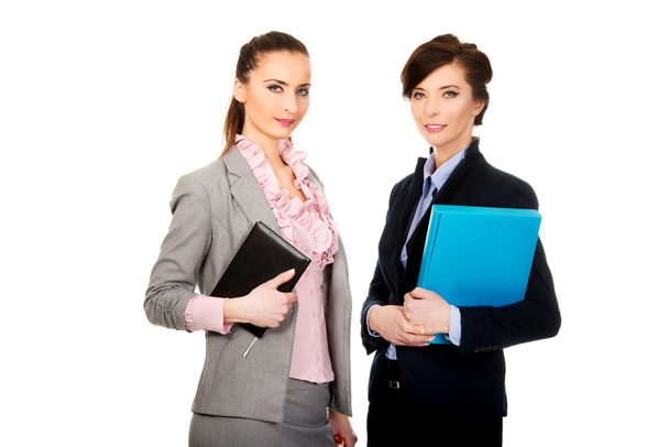 Businesswomans holding their notes. - Photo, Image
