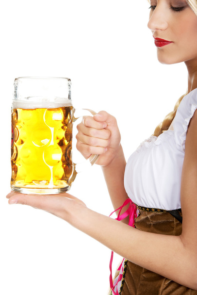 Beautiful bavarian woman with beer. - Foto, afbeelding