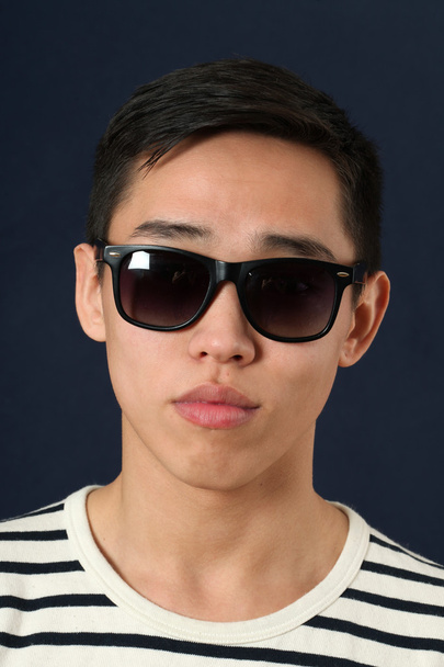 Romantic Asian man in sunglasses - Foto, imagen