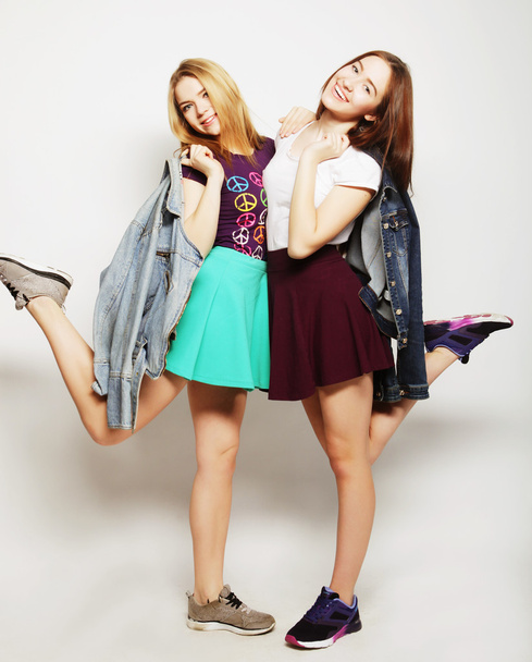 Two young girl friends having fun together. - Foto, imagen