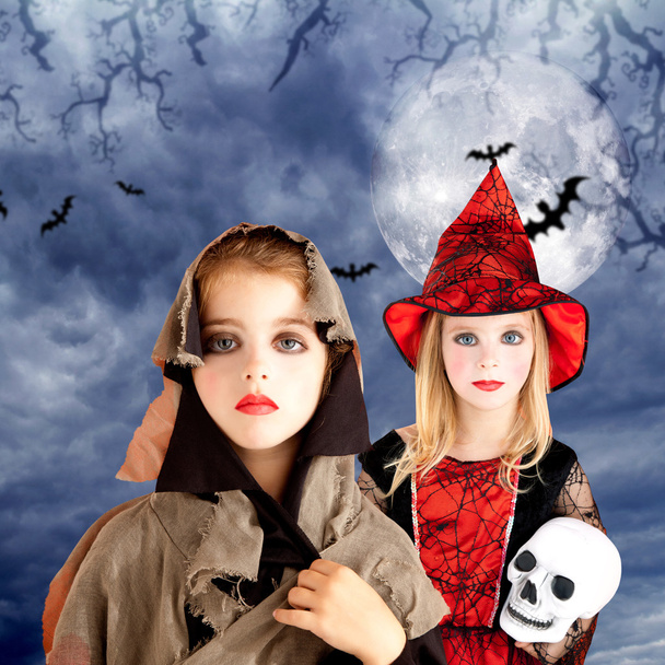Halloween kid girls with skull cloudy moon - Foto, Bild