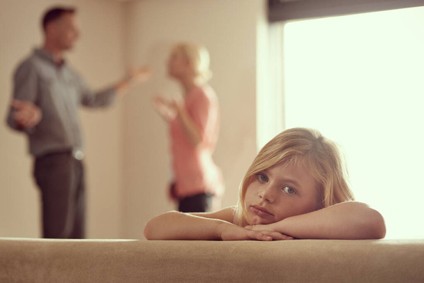 Divorce, mother and unhappy child in argument, sofa and sad in family with stress and anger. Daughter, tired and fight as frustrated, conflict and listen to mom, dad and depression in living room. - Foto, Imagem