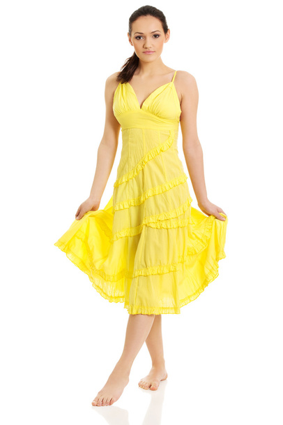 Female model in yellow dress. - Fotoğraf, Görsel