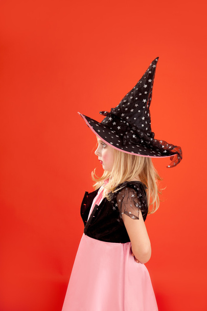 Halloween kid girl costume on orange - Zdjęcie, obraz