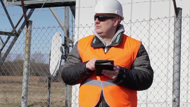 Engineer working with tablet PC at outdoors - Footage, Video