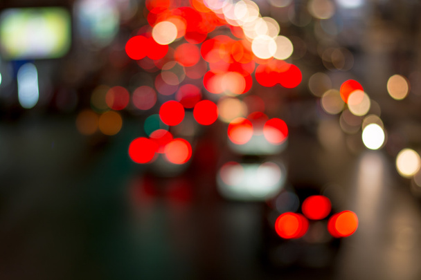 Road éjszakai fény bokeh, defocused életlenítés háttér - Fotó, kép