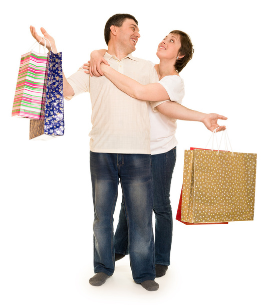 pár férfi és a nő bevásárlószatyor - Fotó, kép