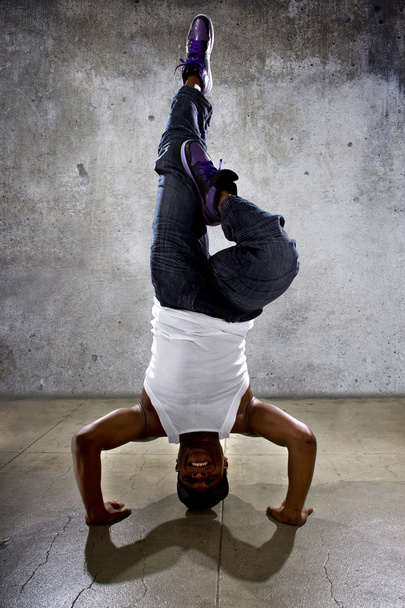Breakdancer doing headstand - Foto, Imagen