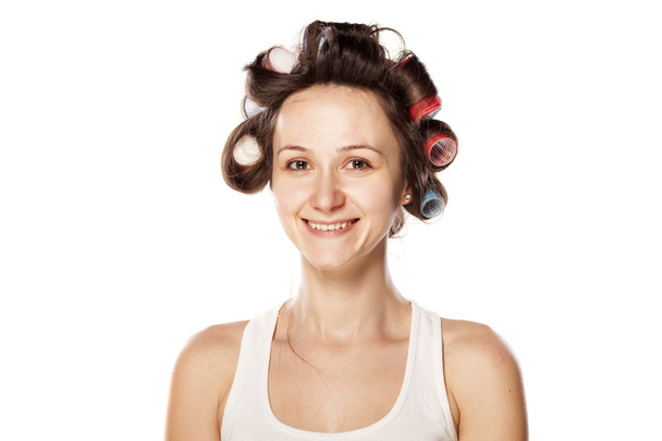 Woman with curlers - 写真・画像